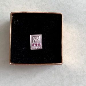 GM 10 year service Tie Tac with rubies on a silver Pin